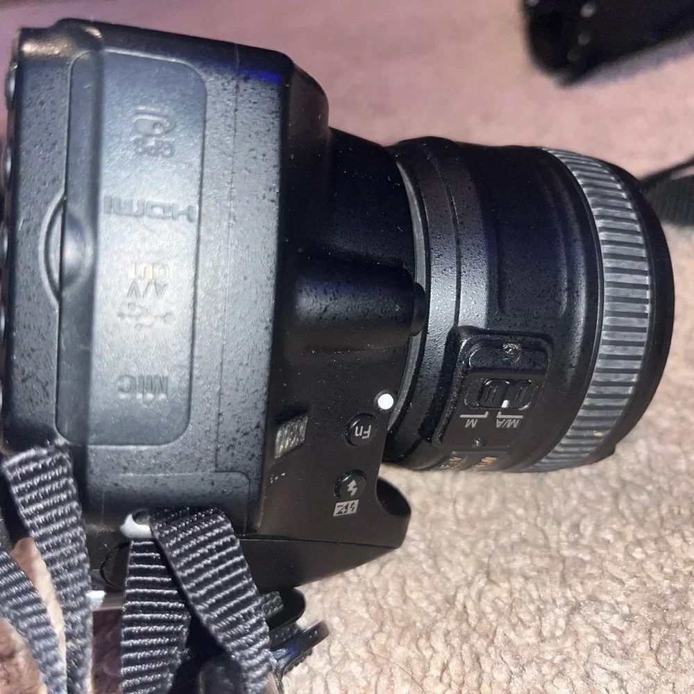 Nikon D3200 Camera. Includes Battery, 3 Nikon Lenses, Battery Charger, and Case.